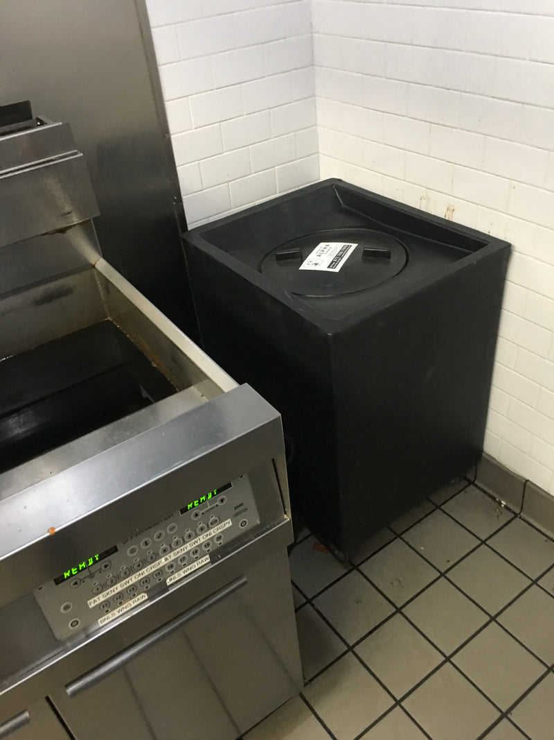 Industrial Kitchen with Fryer and Grease Container